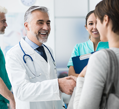 Physician Shaking Hands with a Patient
